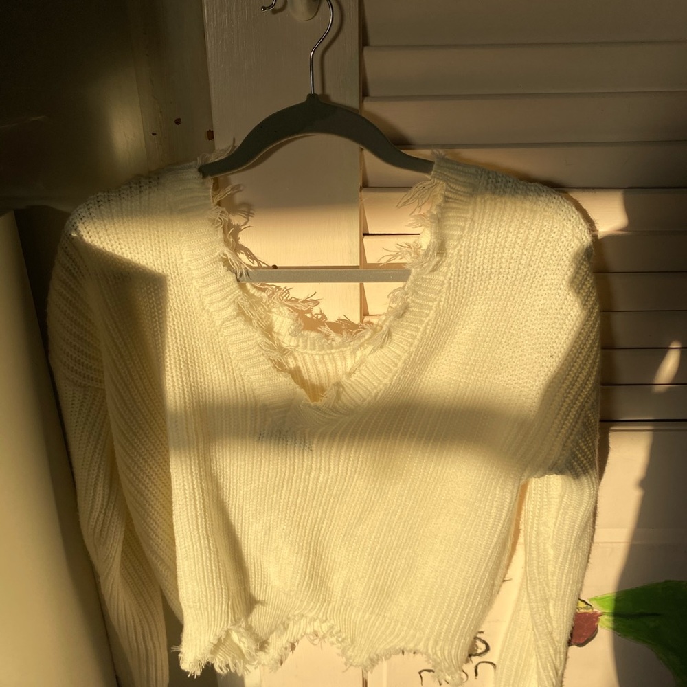 Ribbed neck white sweater off the shoulder